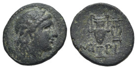 Aeolis, Myrina, c. 2nd century BC. Æ (18mm, 3.41g, 12h). Laureate head of Apollo r. R/ Amphora; kithara r. SNG Copenhagen 225; SNG von Aulock 1666. Gr...