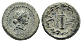 Lydia, Hierocaesarea, c. 2nd-1st century BC. Æ (17mm, 4.33g, 3h). Laureate head of Apollo r. R/ Bow with quiver; monogram to l., IE to r.; all within ...