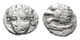 Caria, Mylasa, c. 420-390 BC. AR Tetartemorion (5mm, 0.20g). Head of lion l. R/ Male head (Apollo ?) facing slightly l. Cf. SNG Kayhan 837-8. VF