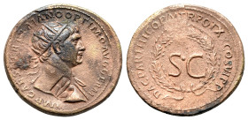 Trajan (98-117). Æ As (24mm, 8.12g, 6h). Rome mint, for circulation in the East, AD 98-99. Radiate bust r., slight drapery; c/m: branch within rectang...