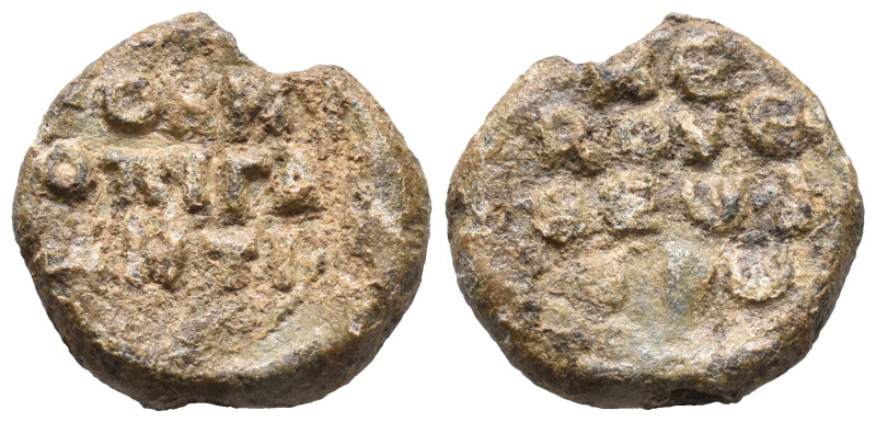 Byzantine PB Seal, to be catalog (17mm, 4.83g). Legend in three lines. R/ Legend...