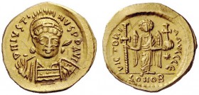 THE BYZANTINE EMPIRE 
 Justin I, 10 July 518 – 1 August 527 
 Solidus circa 519–527, AV 4.09 g. D N IVSTI – NVS P P AVG Helmeted, pearl-diademed and...