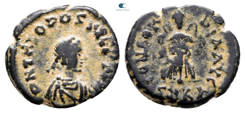 Theodosius II AD 402-450. Cyzicus
Follis Æ

13 mm, 1,07 g



Nearly Very ...