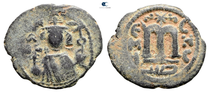 Arab-Byzantine . Hims (Emesa) mint. Abd al-Malik ibn Marwan AH 65-86. 
Æ Fals
...