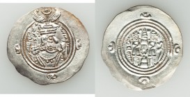 SASANIAN KINGDOM. Khusro II (AD 590-628). AR drachm (32mm, 4.07 gm, 9h). MS. Bust of Khusro II right, wearing mural crown with frontal crescent, two w...
