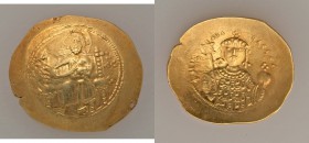Michael VII Ducas (AD 1071-1078). AV histamenon nomisma (28mm, 4.41 gm, 6h). VF. Constantinople. Christ enthroned facing, wearing nimbus cruciger with...