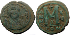 Justinian I (527-565) AE Follis (Bronze, 22.21g, 39mm) Constantinople, RY 15 (541/2).
Obv: D N IVSTINIANVS P P AVG, diademed, helmeted, and cuirassed ...