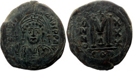 Justinian I (527-565) AE Follis (Bronze, 17.77g, 34mm) Constantinople mint, 4th officina. Dated RY 30 (556/7). 
D N IVSTINI ANVS P P AVC, helmeted and...
