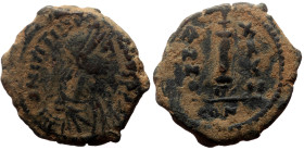 Justinian I (527-565) AE Decanummium (Bronze, 3.94g, Constantinople.
Obv: DNIVSTINI-ANVS PPAVC. Pearl diademed, draped, cuirassed bust right.
Rev: L...