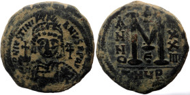 Justinian I (527-565) AE Follis (Bronze, 18.64g, 34mm) Theoupolis (Antioch) mint, 5th officina. Dated RY 24 (550/1). 
Obv: Helmeted and cuirassed bust...