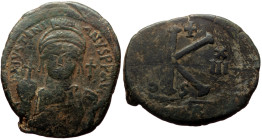 Justinian I (527-565), half-follis or 20 nummi (Bronze, 15.22 g, 32.8 mm), Carthago, dated Regnal Year 13 = 539/540, 6th officina. Overstruck.
Obv: D ...