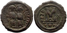 Justin II (565-578) AE Follis (Bronze, 12.55g, 30mm) Constantinople, Dated year 10 = 536/537. 
Obv: DN IVSTINVS PP AV, Justin II and Sophia seated on ...