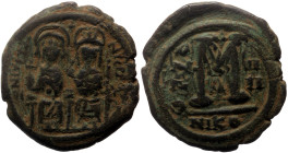 Justin II, with Sophia (565-578) AE Follis (Bronze, 12.73g, 30mm) Nicomedia, Dated RY 8 (572/3). 
Obv: Nimbate figures of Justin, holding globus cruci...
