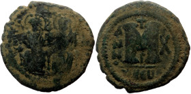 Justin II, with Sophia (565-578) AE follis (Bronze, 12.02g, 30mm) Theoupolis (Antioch) RY 10 (574/575).
Obv: Justin and Sophia seated facing on doubl...