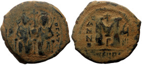 Justin II and Sophia (565-578) AE Follis (Bronze, 12.43g, 31mm) 565-578 Antioch, year 8.
Obv: blundered legend with Justin left, Sophia right nimbate...