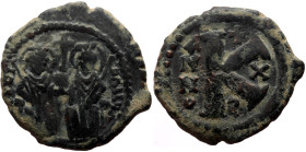 Justin II (565-578) and Sophia, AE half follis, (Bronze, 6.22 g, 23.7 mm), Theoupolis (Antioch), dated RY 10 = 574/5.
Obv: Justin II and Sophia nimbat...