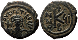 Maurice Tiberius (582-602) AE Half Follis (Bronze, 4.93g, 21mm) Antioch as Theopolis.
Obv: DN MA TIBERI, crowned and mantled bust facing, holding glob...