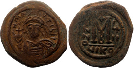 Maurice Tiberius (582-602) AE Follis (Bronze, 10.76g, 31mm) Nicomedia, RY 7 = AD 588/9. 
Obv: D N mAV TIbЄ P P Helmeted and cuirassed bust of Maurice ...