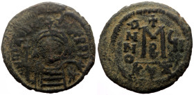 Maurice Tiberius (582-602.) AE Follis (Bronze, 27mm, 9.20g) Cyzicus 2nd officina. Dated RY 6 (587/8). 
Obv: Helmeted and cuirassed bust facing, holdin...