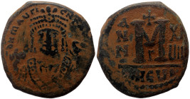 Maurice Tiberius (582-602) AE Follis (Bronze, 11.09g, 28mm) Theoupolis (Antiochia), 597-598 AD.
Obv. Crowned bust of Maurice facing, wearing consular ...