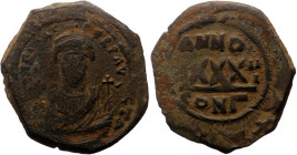 Phocas AE 30 Nummi (Bronze, 11.17g, 33mm) Constantinople, dated RY 6 = AD 607/8. 
Obv: D N FOCAS PЄRP AVG, draped and cuirassed bust facing, wearing c...