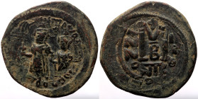 Heraclius, with Heraclius Constantine (610-641) AE Follis (Bronze, 11.29g, 33mm) Nicomedia, RY (612/3), Overstruck on a follis of Maurice Tiberius
Obv...