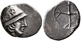 GAUL. Massalia. Circa 450-410 BC. Obol (Silver, 11 mm, 0.79 g). Male head with long hair to right, wearing helmet adorned with wheel of four spokes on...