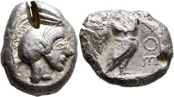 ATTICA. Athens. Circa 485/480 BC. Tetradrachm (Silver, 26 mm, 17.48 g, 3 h). Head of Athena to right, wearing crested Attic helmet and circular earrin...