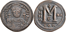 Justinian I, 527-565. Follis (Bronze, 40 mm, 22.24 g, 7 h), Constantinopolis, RY 12 = 538/9. D N IVSTINIANVS P P AVC Helmeted, diademed and cuirassed ...