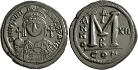 Justinian I, 527-565. Follis (Bronze, 39 mm, 23.49 g, 6 h), Constantinopolis, RY 12 = 538/9. D N IVSTINIANVS P P AVC Helmeted, diademed and cuirassed ...