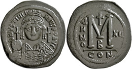Justinian I, 527-565. Follis (Bronze, 40 mm, 23.66 g, 6 h), Constantinopolis, RY 12 = 538/9. D N IVSTINIANVS P P AVC Helmeted, diademed and cuirassed ...
