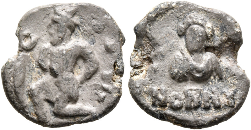 Nonnos, late 5th-6th century. Seal (Lead, 17 mm, 2.91 g, 12 h). Captive kneeling...