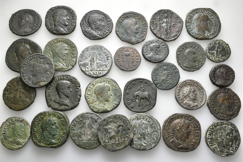 A lot containing 29 silver ad bronze coins. Including: Roman Provincial and Roma...