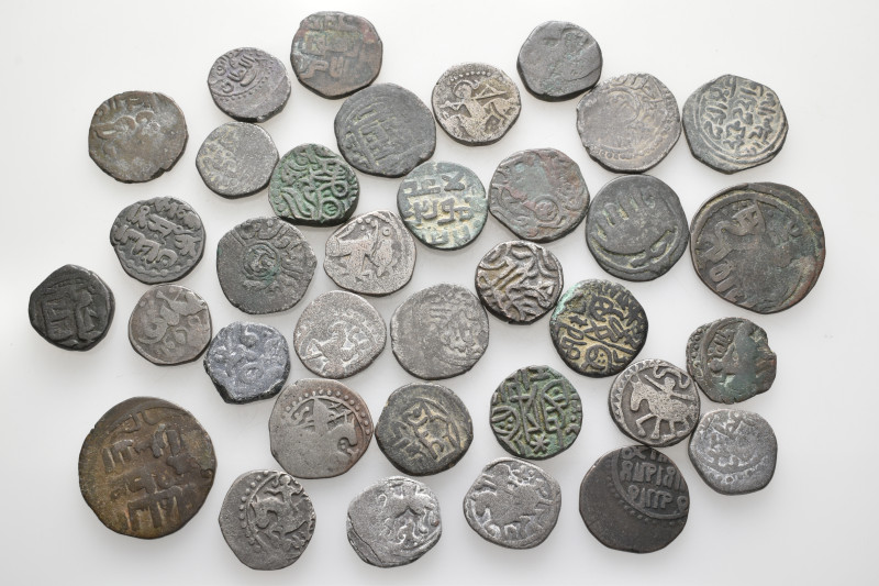 A lot containing 35 bronze coins. All: Kharizmshahs. Dirhams and Jitals. About v...