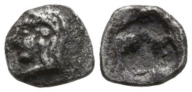 IONIA. Kolophon. (6th century BC).
AR Tetartemorion (5.3mm 0.14g)
Obv: Archaic head of Apollo left.
Rev: Quadripartite incuse square.