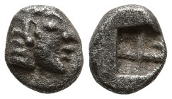 IONIA. Kolophon. (Circa 530/25-500 BC)
AR Tetartemorion (4.5mm 0.18g)
Obv: Archaic head of Apollo right.
Rev: Quadripartite incuse square.
