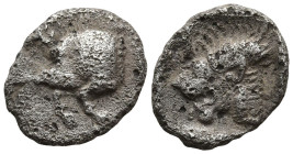 MYSIA. Kyzikos. (450-400 BC)
AR Obol (10.5mm 0.72g)
Obv: Forepart of boar left; to right, tunny upward
Rev: Head of roaring lion left within incuse...