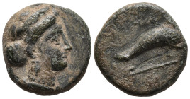 ISLANDS off CARIA. Nysiros. Civic issue. (Mid 4th-late 3rd century BC)
AE Bronze (11.3mm 1.4g)
Obv: Diademed head of Aphrodite right
Rev: Dolphin leap...