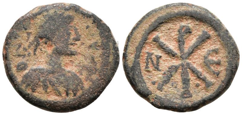 Justin I, (AD 518-527) Constantinople
AE Pentanummium
Obv: Pearl diademed, dra...