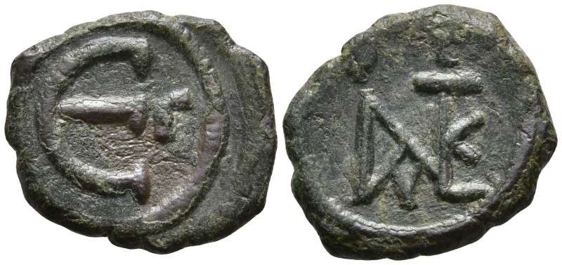 Justin II (565-578 AD). constantinople
AE Pentanummium (16.9mm 2.28g)
Obv: Mon...