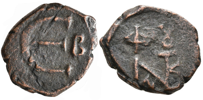 Justin II (565-578 AD). Constantinople
AE Pentanummium (12.6mm 1.49g)
Obv: Mon...