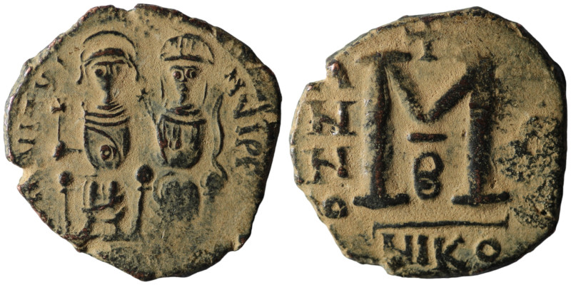 Justin II and Sophia (AD 565-578) Nikomedia
AE Follis (26mm, 9,20g)

Artificial ...