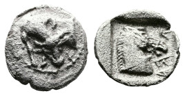 Krannon, circa 462/1-460 BC. AR Obol (11mm, 0,88 g.). Forepart of bull to left, his head toned back to graze. Rev. Κ-RΑ (retrograde) Head of a bridled...