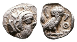 Attica, Athens, circa 454-404 BC. AR Obol (9mm, 0,65 g.). Head of Athena to right, wearing earring, necklace, and crested Attic helmet decorated with ...