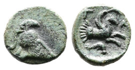 Mysia, Lampsakos, 4th.-3rd. Century BC. AE (10mm, 1,04g.). Corinthian helmet to right. Rev. ΛΑM, forepart of Pegasos to right; below, dolphin to right...