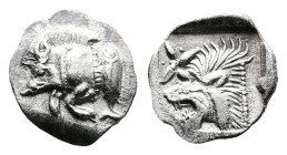 Mysia, Kyzikos, circa 450-400 BC. AR Hemiobol (9mm, 0.42g.). Forepart of boar left; to right, tunny upward. Rev. Head of roaring lion left; star to up...
