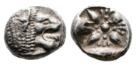 Ionia, Miletos, late 6th.-early 5th. Century BC. AR Obol (10mm, 1.19 g.). Lion forepart right, with head turned to left. Rev. Stellate floral design w...