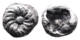 Ionia, Erythrai, circa 530-480 BC. AR Hemitetartemorion or 1/96 Stater, Lydo-Milesian standard (4mm, 0.12g.). Rosette or floral pattern with central p...