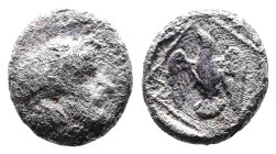 Ionia, Magnesia ad Maeander. Archepolis, son of Themistokles, ca. 459 BC. AR Tetartemorion (6mm, 0.19 g.). Diademed and bearded male head to right. Re...