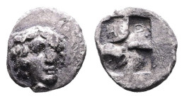 Ionia, Kolophon, circa 450-410 BC. AR Tetartemorion (7mm, 0,23g.). Head of Apollo facing slightly right. Rev. Quadripartite incuse square; K O Λ O in ...